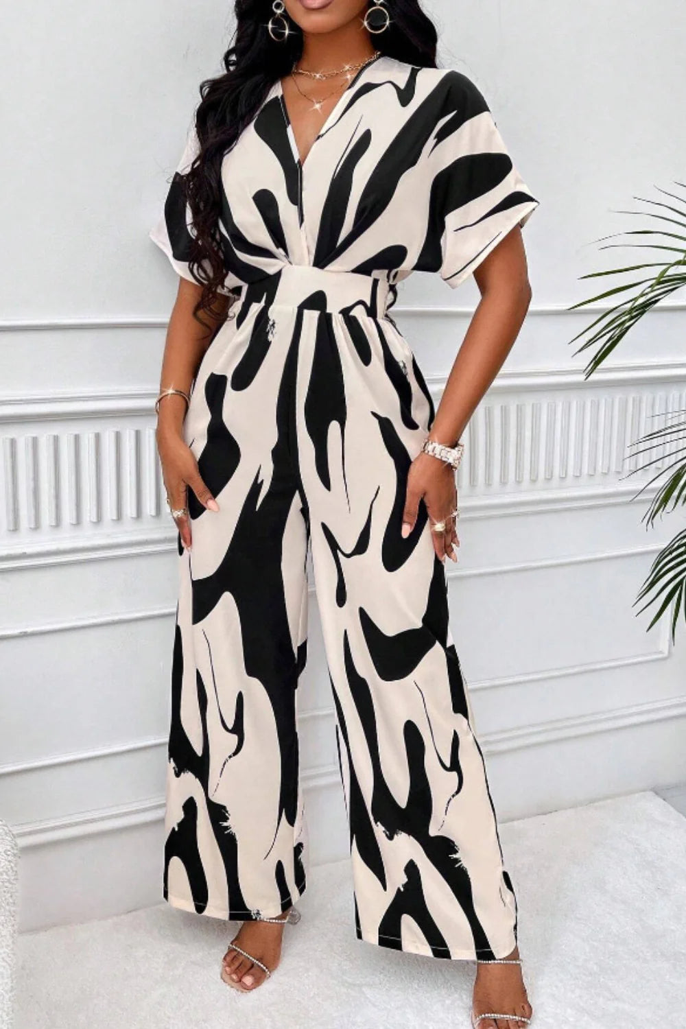 Aura Curve – Printed Wide-Leg Wrap Jumpsuit