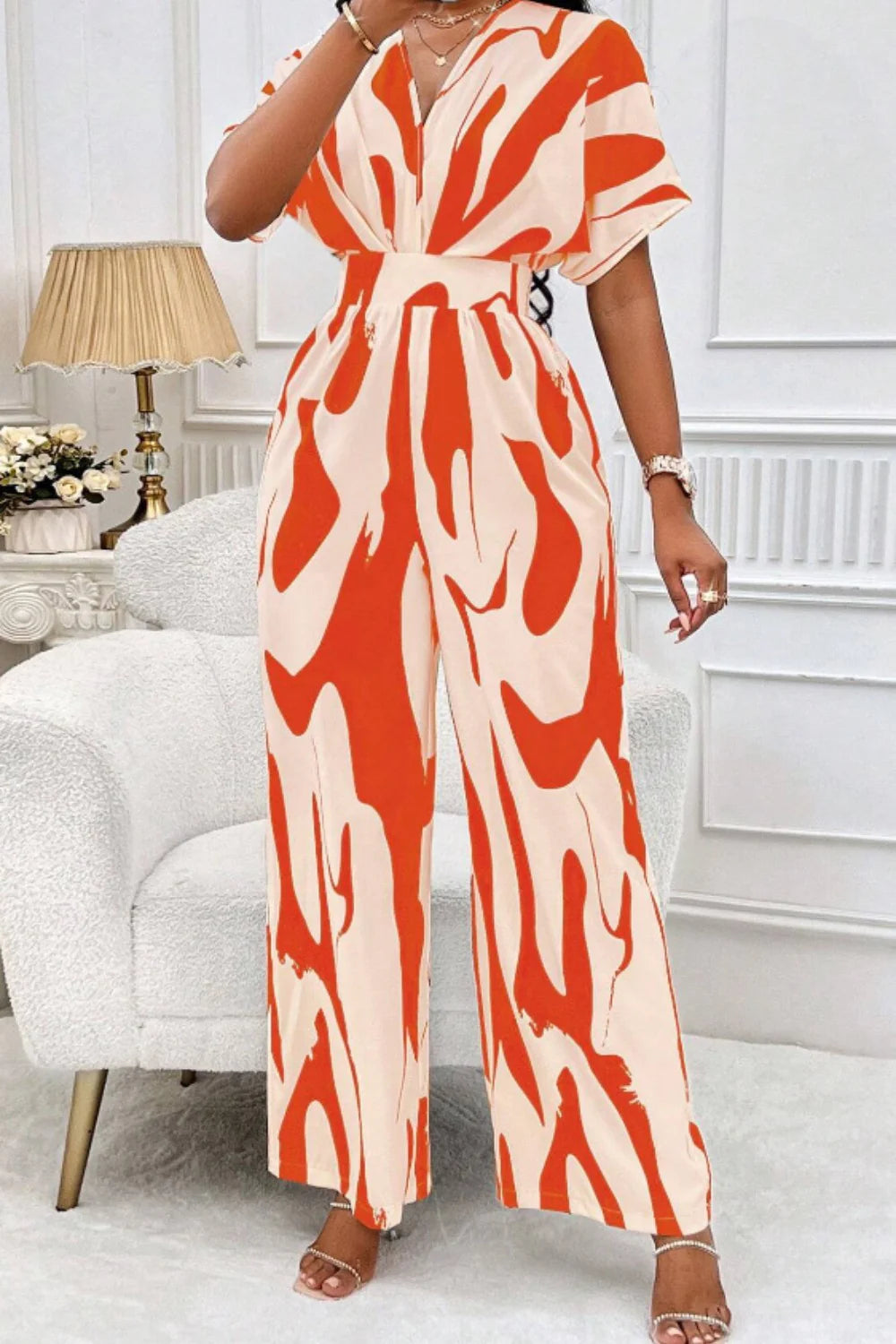 Aura Curve – Printed Wide-Leg Wrap Jumpsuit